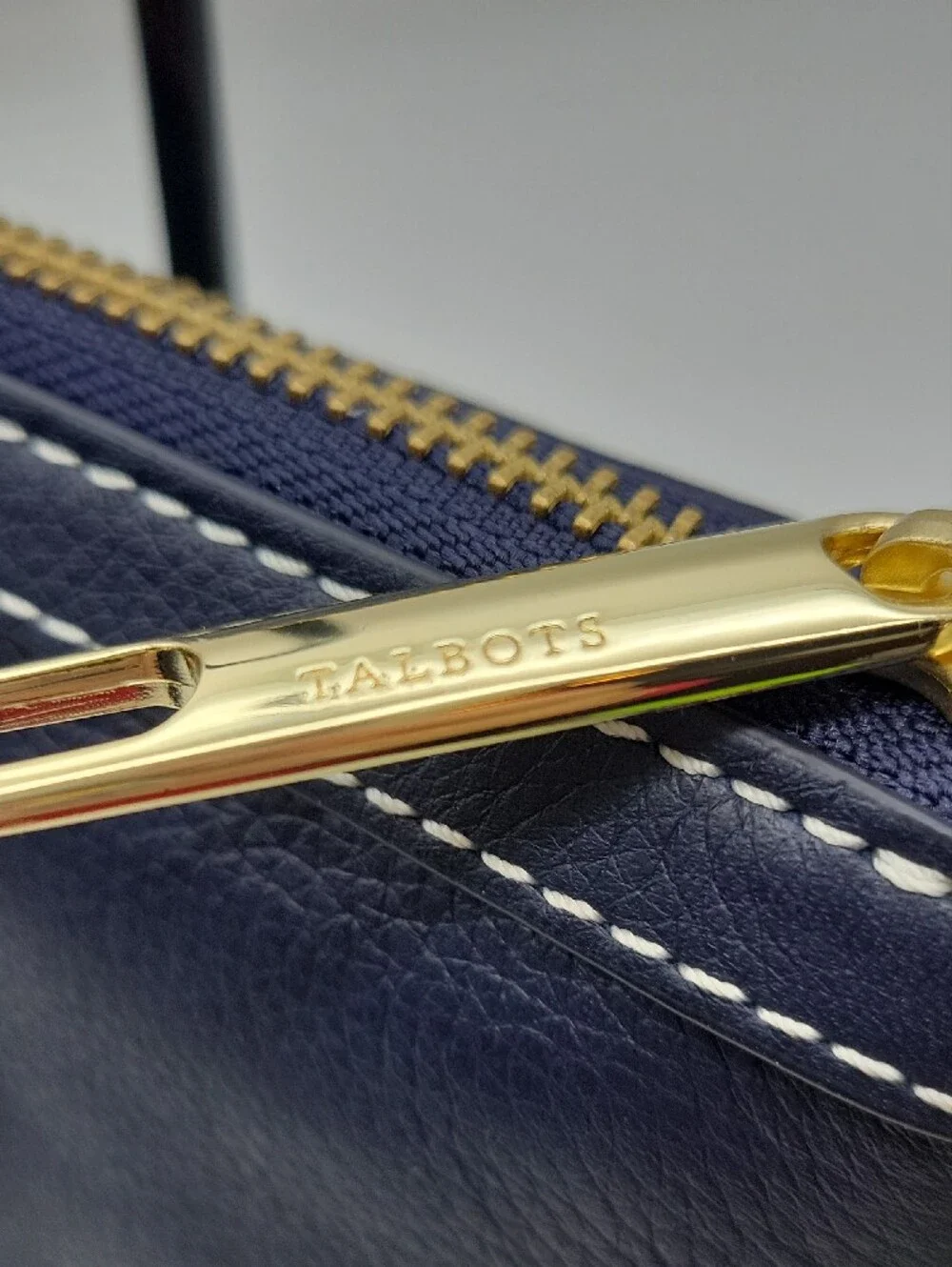 Talbots Navy Leather Wristlet with White Stitching and Gold Hardware